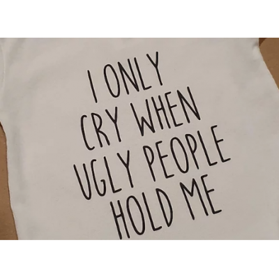 Rompertje "I only cry when ugly people hold me" Rompertje "I only cry when ugly people hold me"